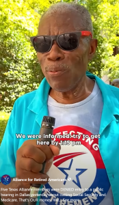 Screenshot from video shows man discussing efforts to attend hearing.